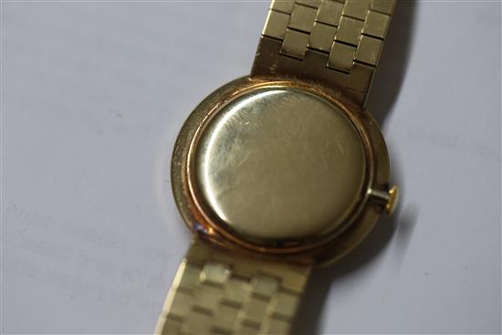 A gentlemans early 1960s 9ct gold Longines manual wind wrist watch, on a 9ct gold Longines bracelet, in Longines box.